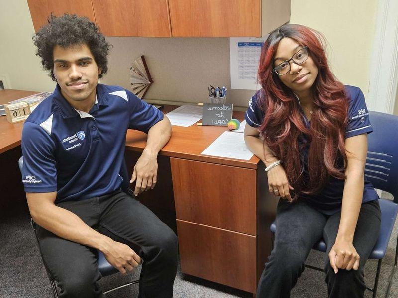 Two students in an office